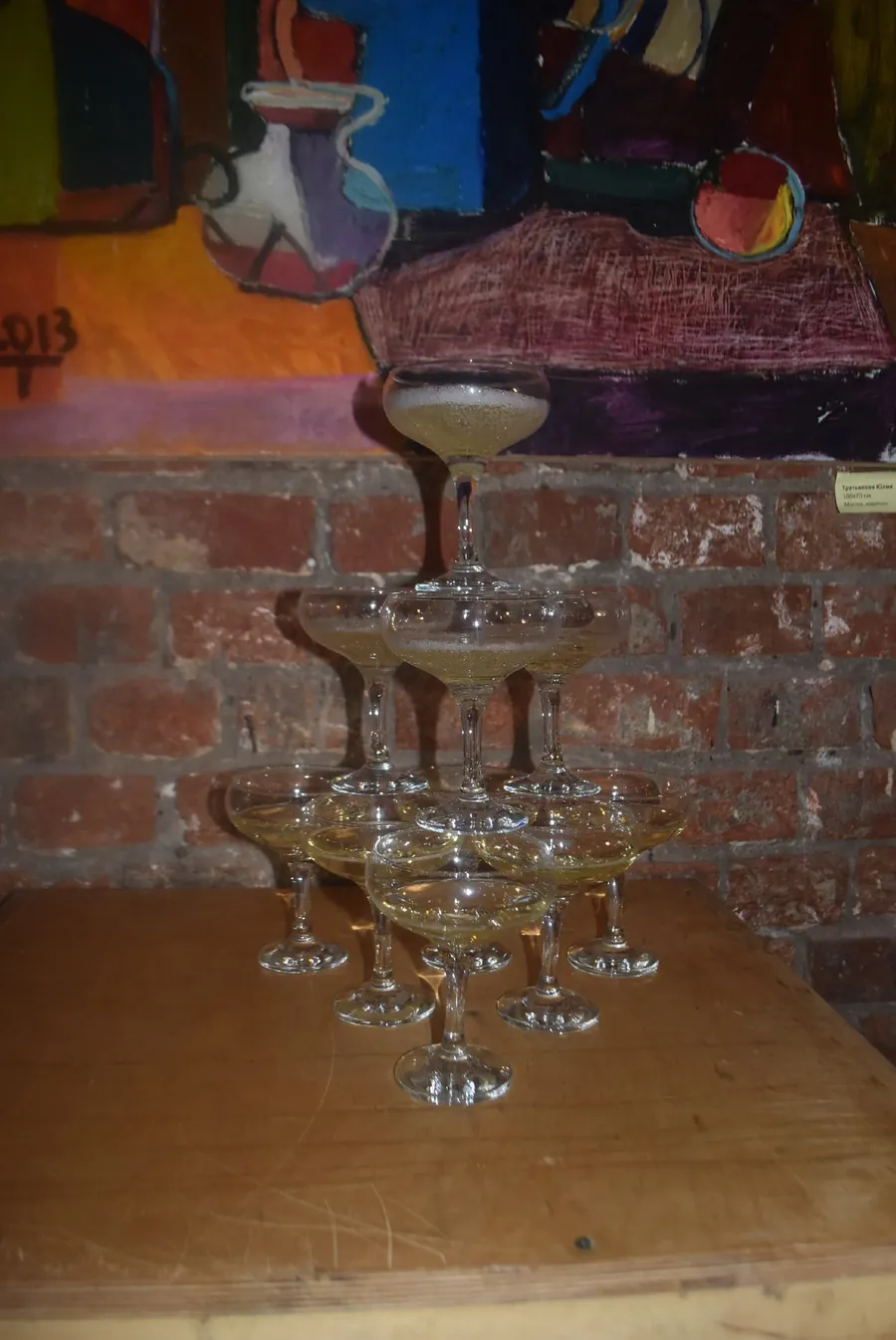 A champagne tower against the brick wall