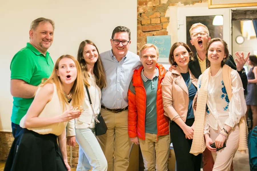A group of guests cheering and laughing together